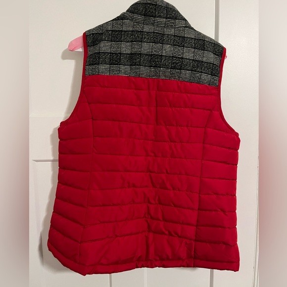 Red puffer vest with accent plaid material. - Picture 2 of 3